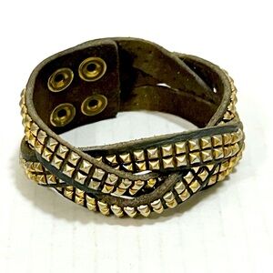 Vegan textured, shiney, studded, braided front, faux suede inner Adj. Snap Strap